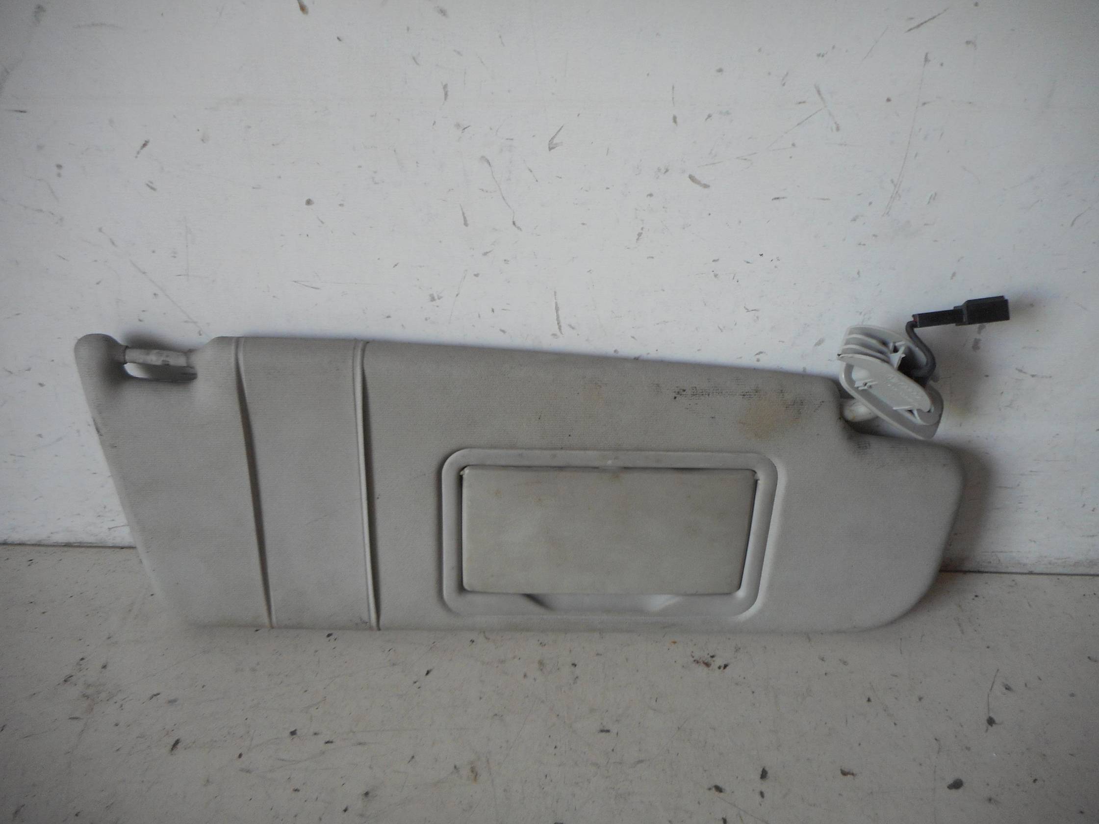 Aletta parasole parabrezza sx.